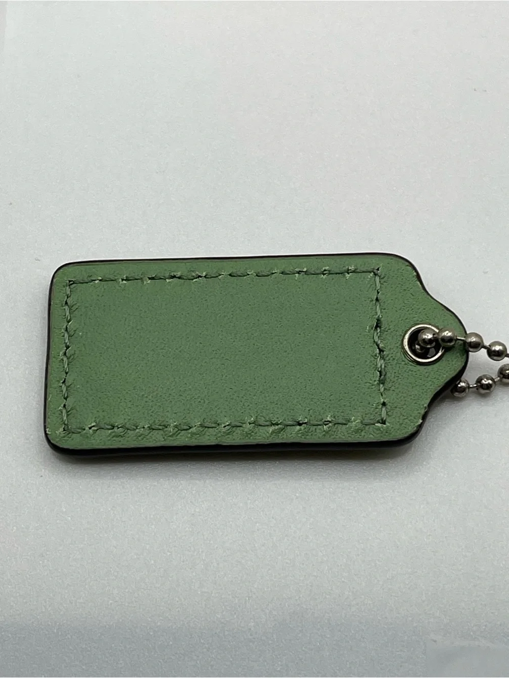 Coach Sage Green Patent Leather Hang Tag Keychain with Silver Chain